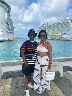 John and Veronica posing at a sunny cruise port