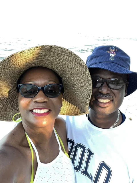 John and Veronica sharing a cheerful vacation selfie